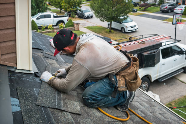Professional Roofing technician working in Cross Plains, IN